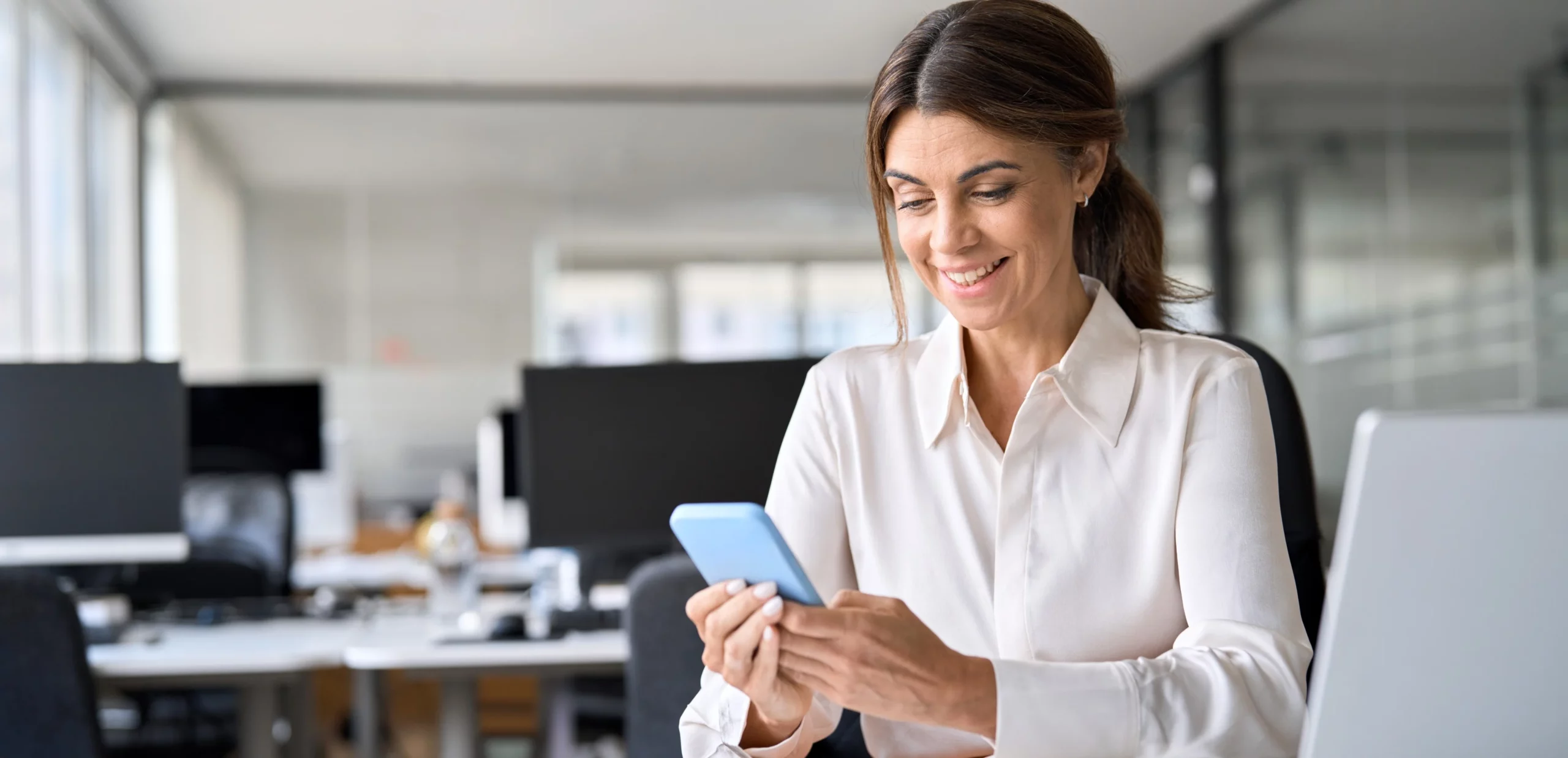 Woman holding a smartphone